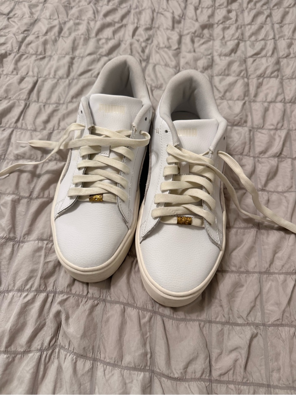 Puma Women’s White Low-Top Sneakers with Gold Lace Accent